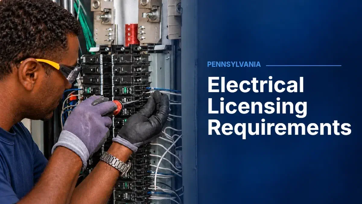 Electrician working in an open breaker panel, beside “Electrical Licensing Requirements” and the label “Pennsylvania.”