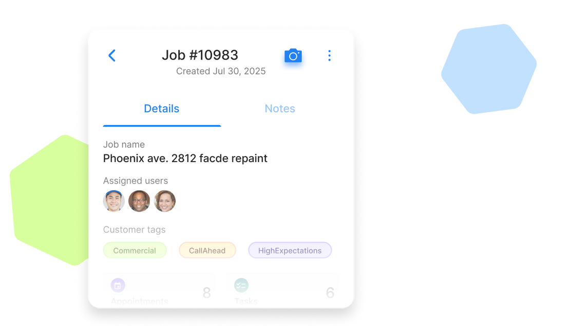 Cinderblock UI showing job details, assigned users, and customer tags, with a camera icon for capturing photos.