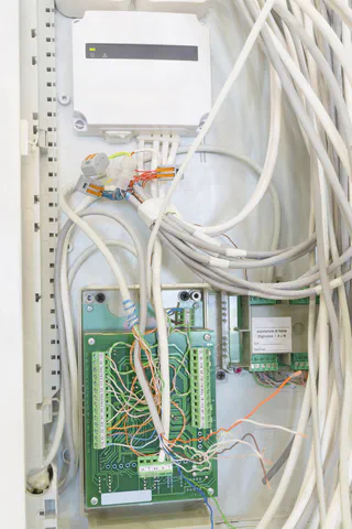 Electrical wiring panel in progress, organized with the help of Cinderblock job management software.